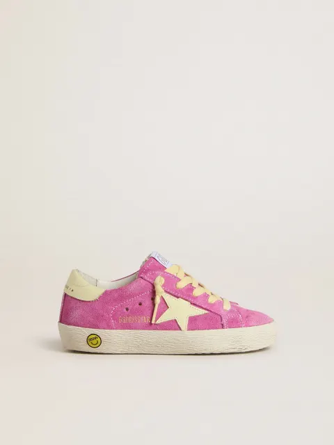 Super-Star Junior in suede rosa con stella e talloncino giallo chiaro
