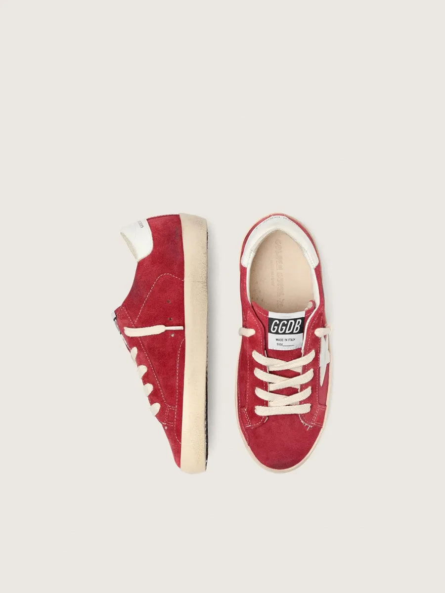 Super-Star Junior in suede rosso con stella e talloncino in pelle bianca