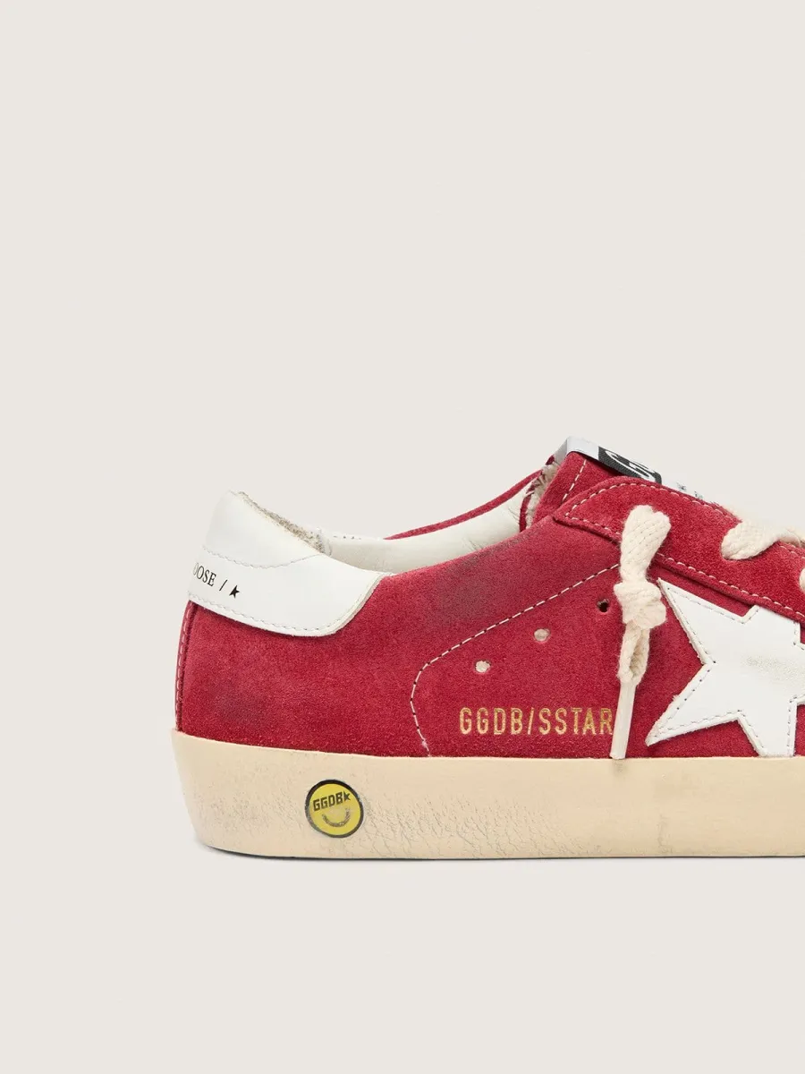 Super-Star Junior in suede rosso con stella e talloncino in pelle bianca