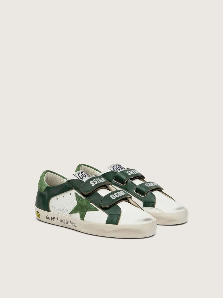 Old School junior in pelle bianca con stella in suede verde e inserti in pelle verde