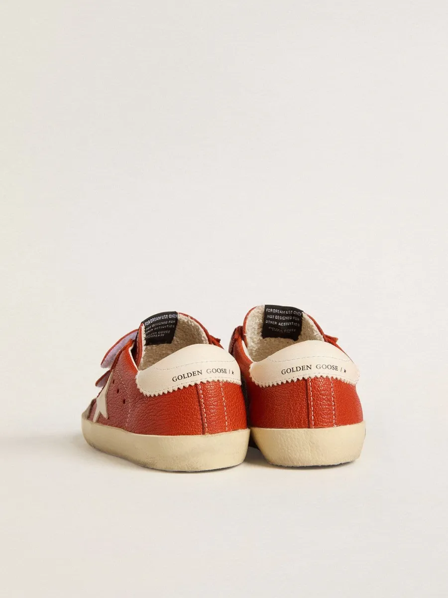Old School Junior in nappa arancione con stella bianca e talloncino in pelle crema