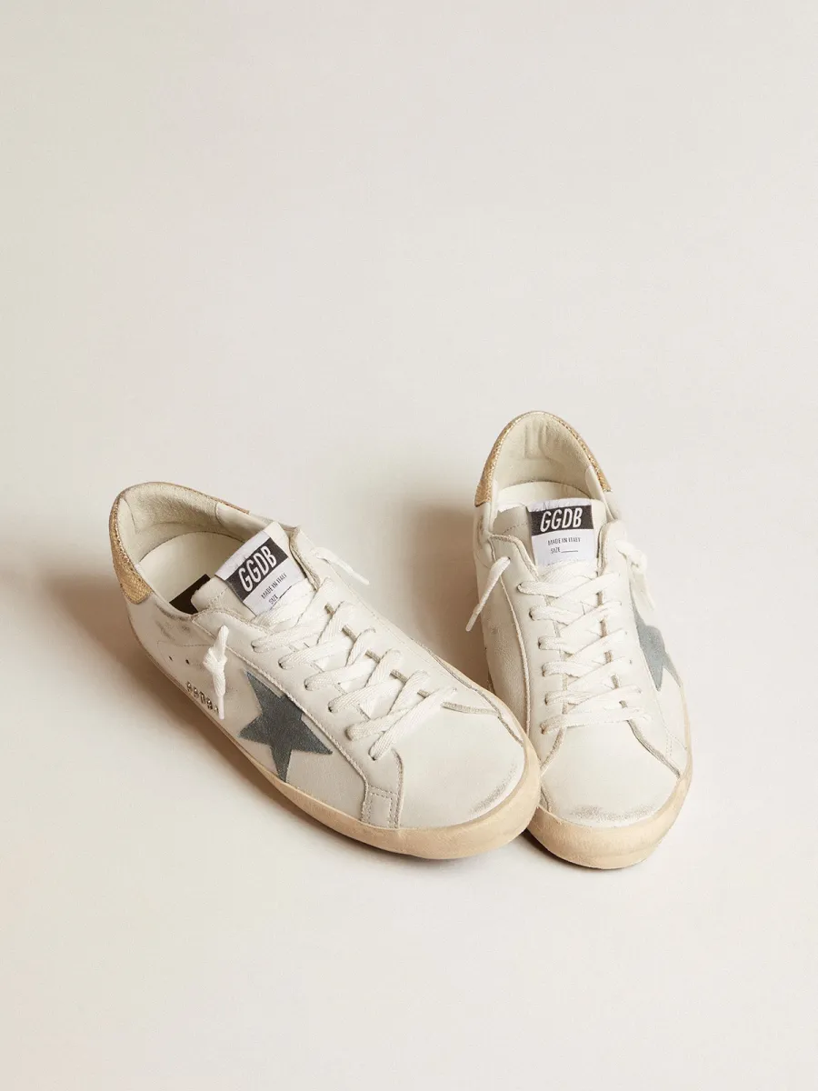 Super-Star Uomo con stella in suede e talloncino in pelle pitonata platino