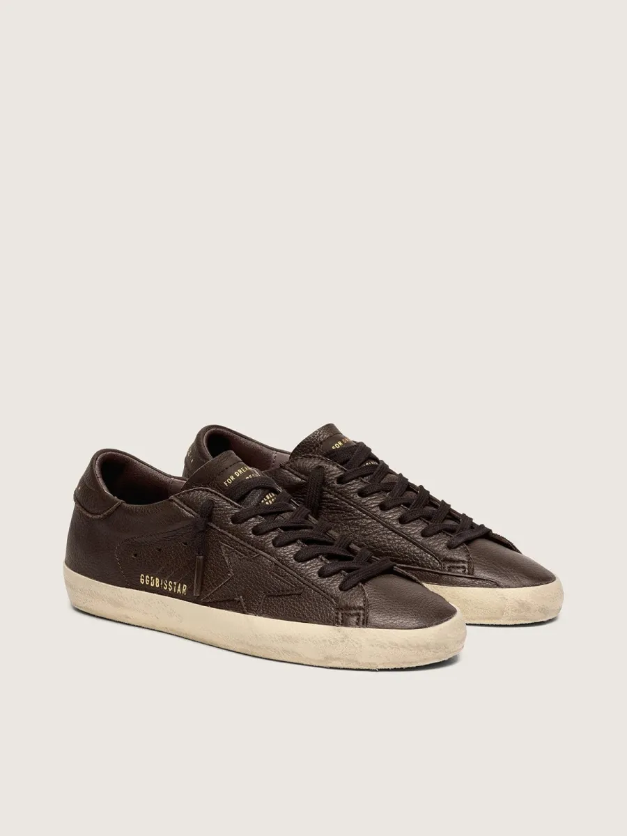 Super-Star uomo in pelle marrone scuro con stella  in pelle ton sur ton