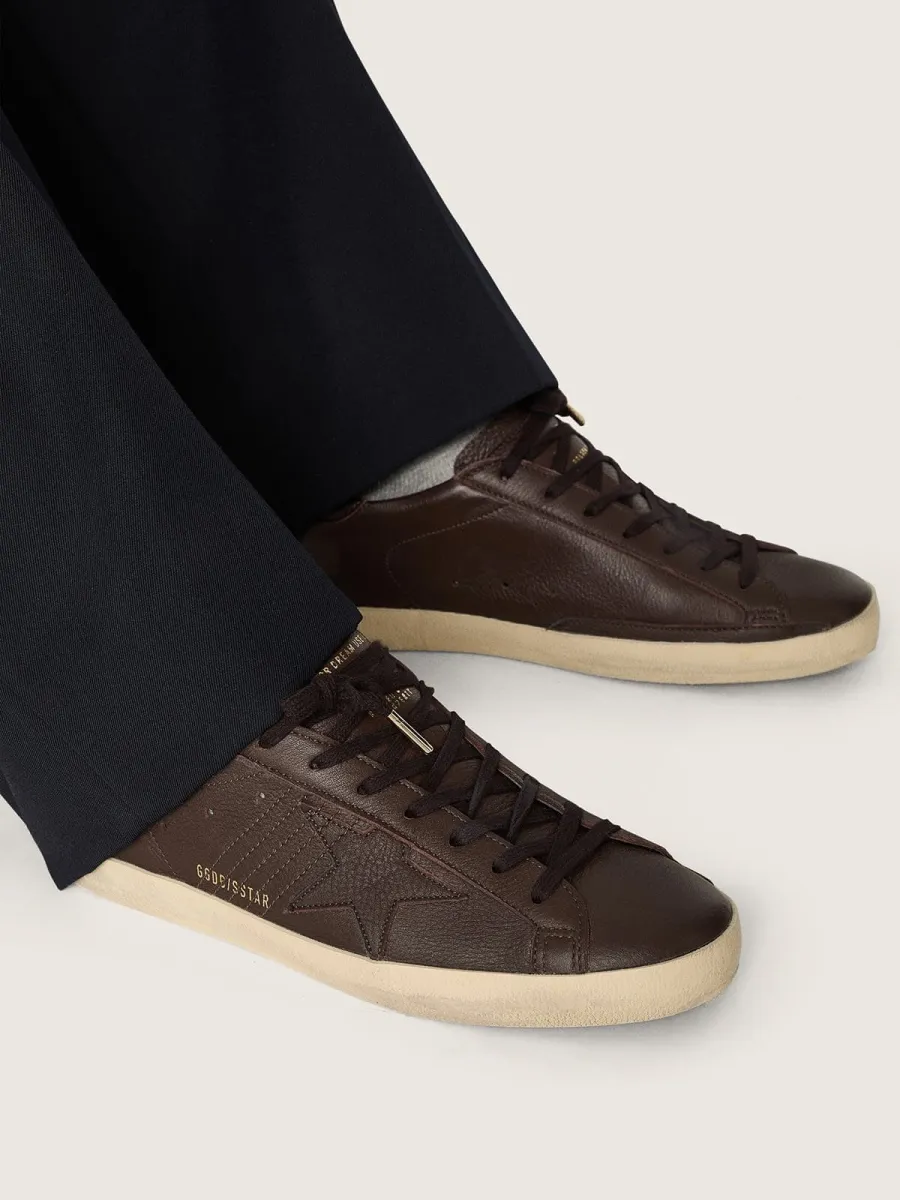 Super-Star uomo in pelle marrone scuro con stella  in pelle ton sur ton