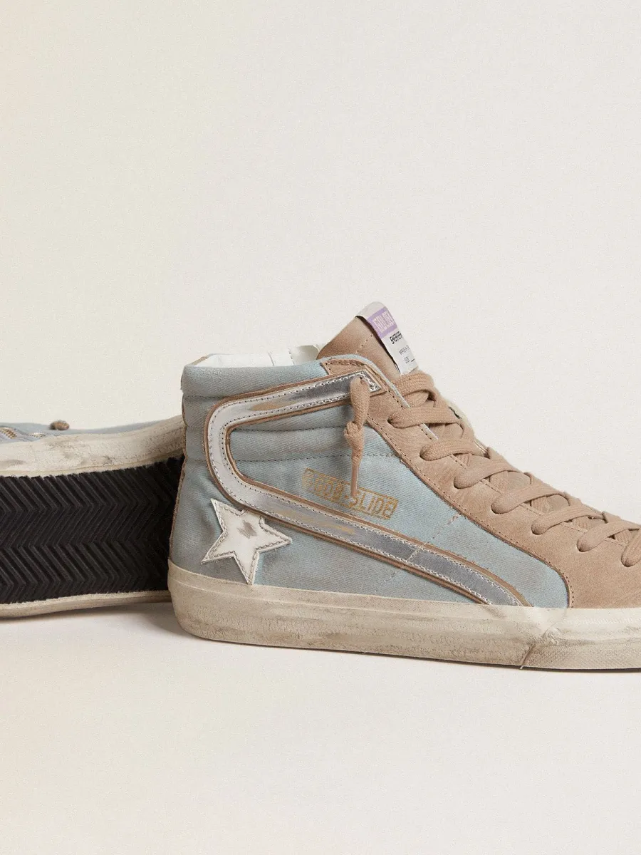 Slide uomo in canvas azzurro con virgola in pelle laminata argento