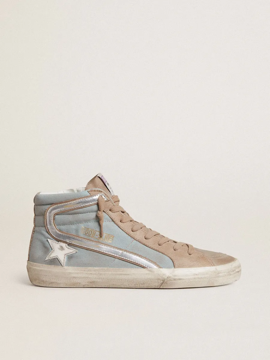 Slide uomo in canvas azzurro con virgola in pelle laminata argento