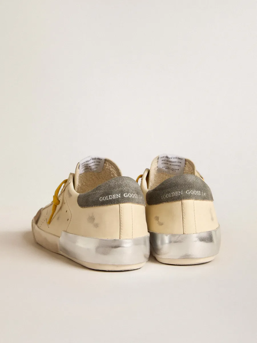 Super-Star Uomo in pelle con stella traforata e talloncino in suede grigio