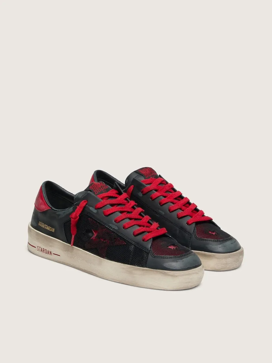 Stardan uomo in pelle nera con stella in pelle rossa inserti in rete nera e pelle rossa