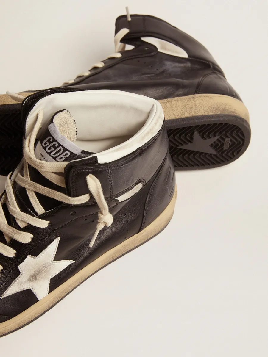 Sky-Star in nappa nera con stella in pelle bianca
