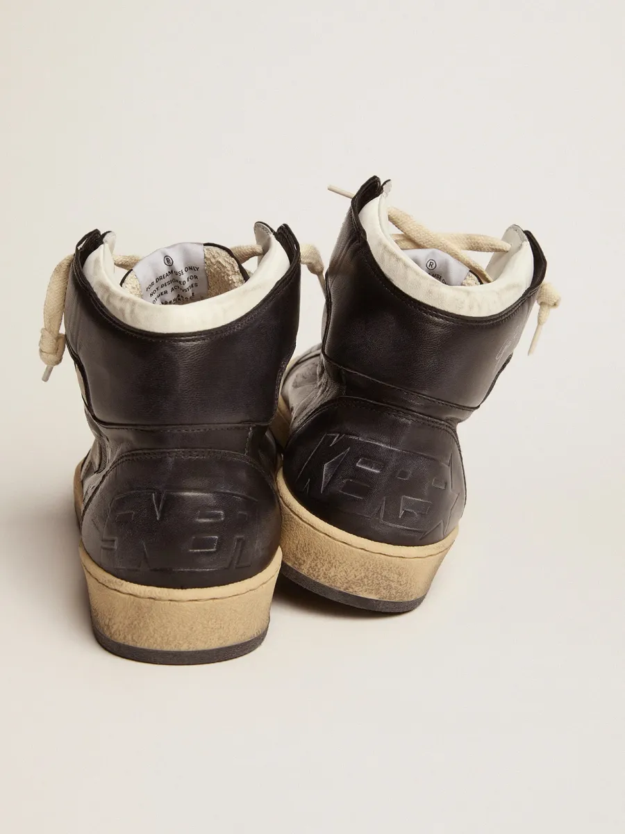 Sky-Star in nappa nera con stella in pelle bianca