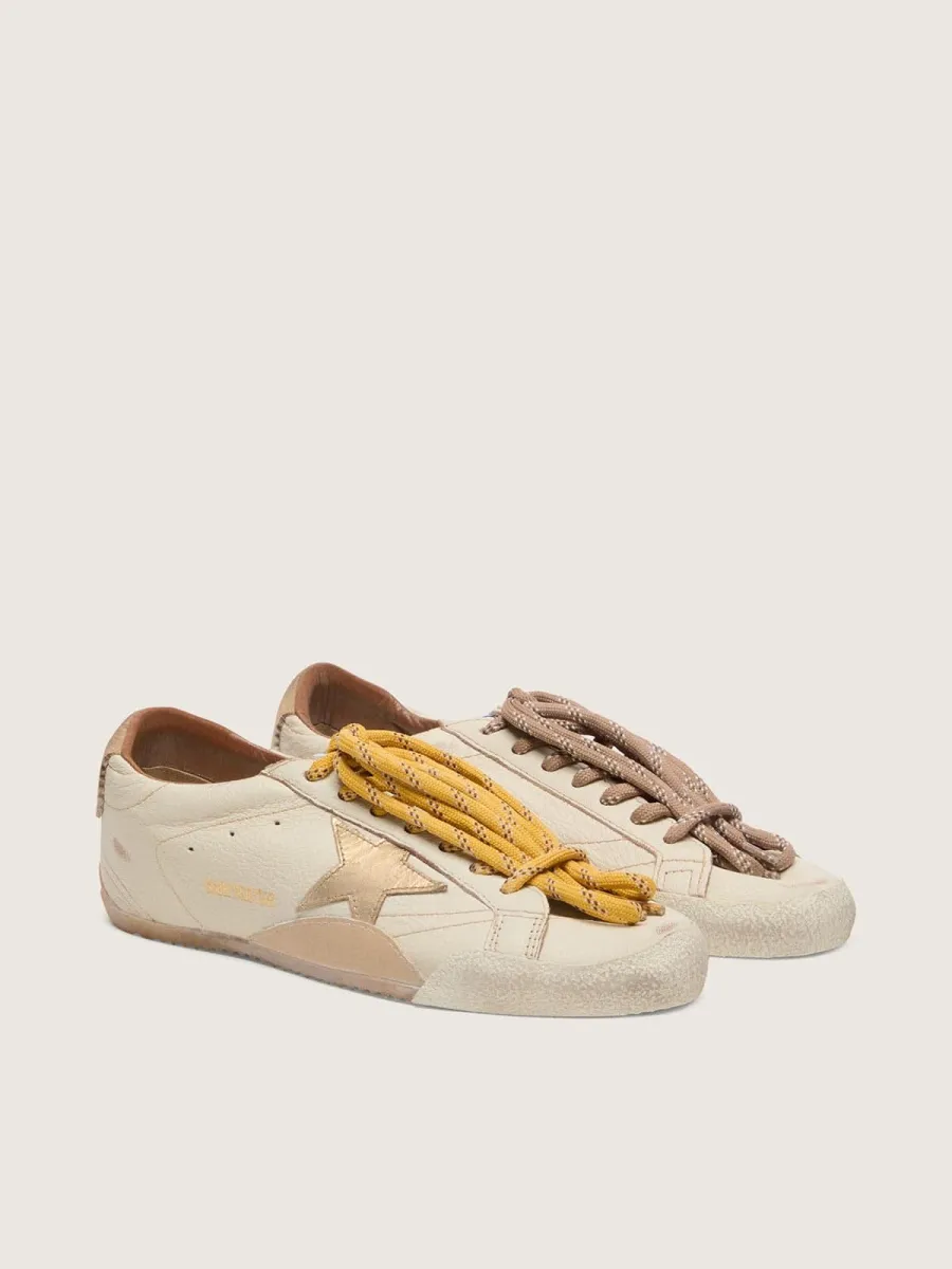 True-Star Uomo in nappa bianca con stella in pelle laminata oro e talloncino in suede beige
