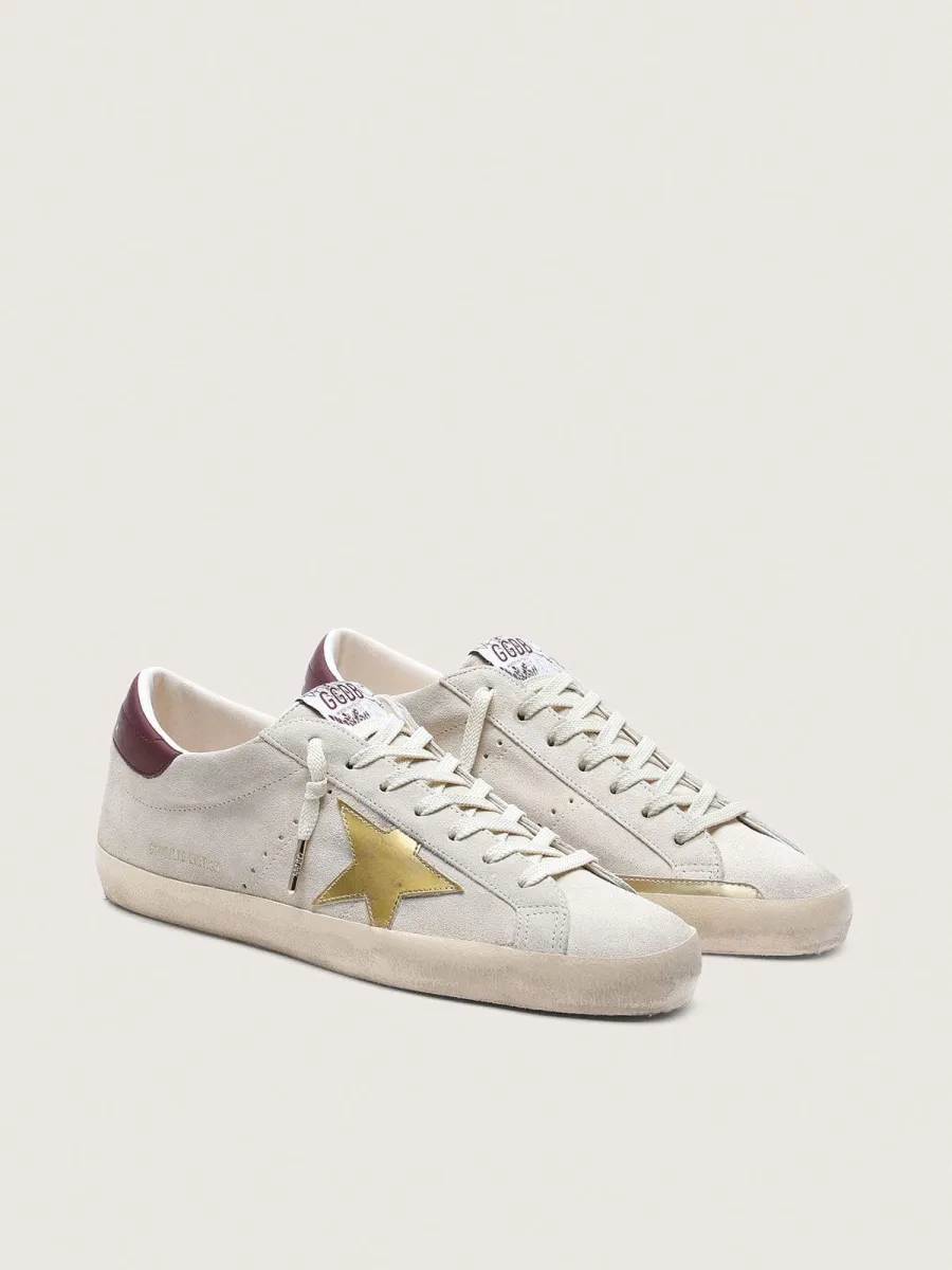 Super-Star Uomo CNY in suede avorio con stella in pelle laminata e e talloncino in pelle