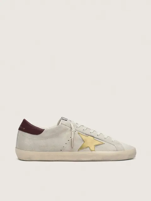 Super-Star Uomo CNY in suede avorio con stella in pelle laminata e e talloncino in pelle