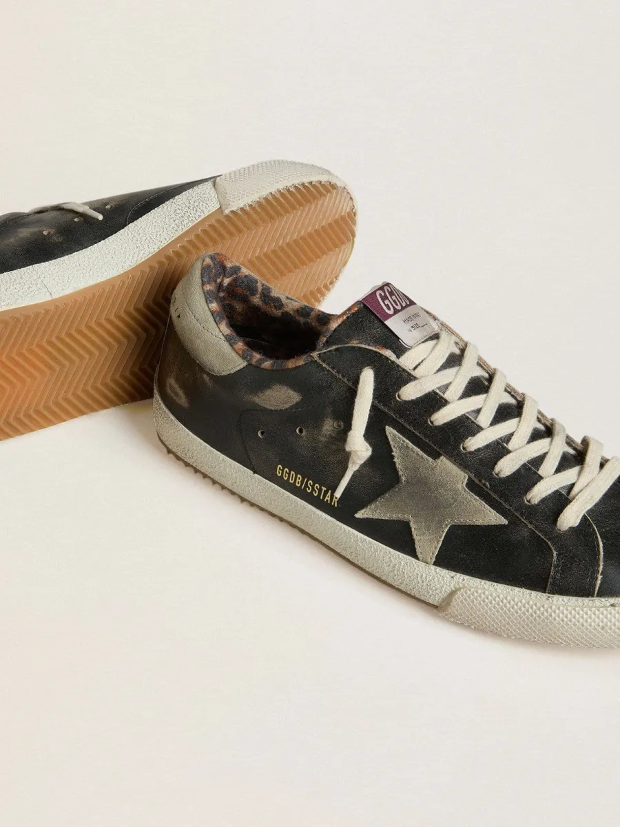 Super-Star Uomo in pelle nera con stella e talloncino in suede grigio