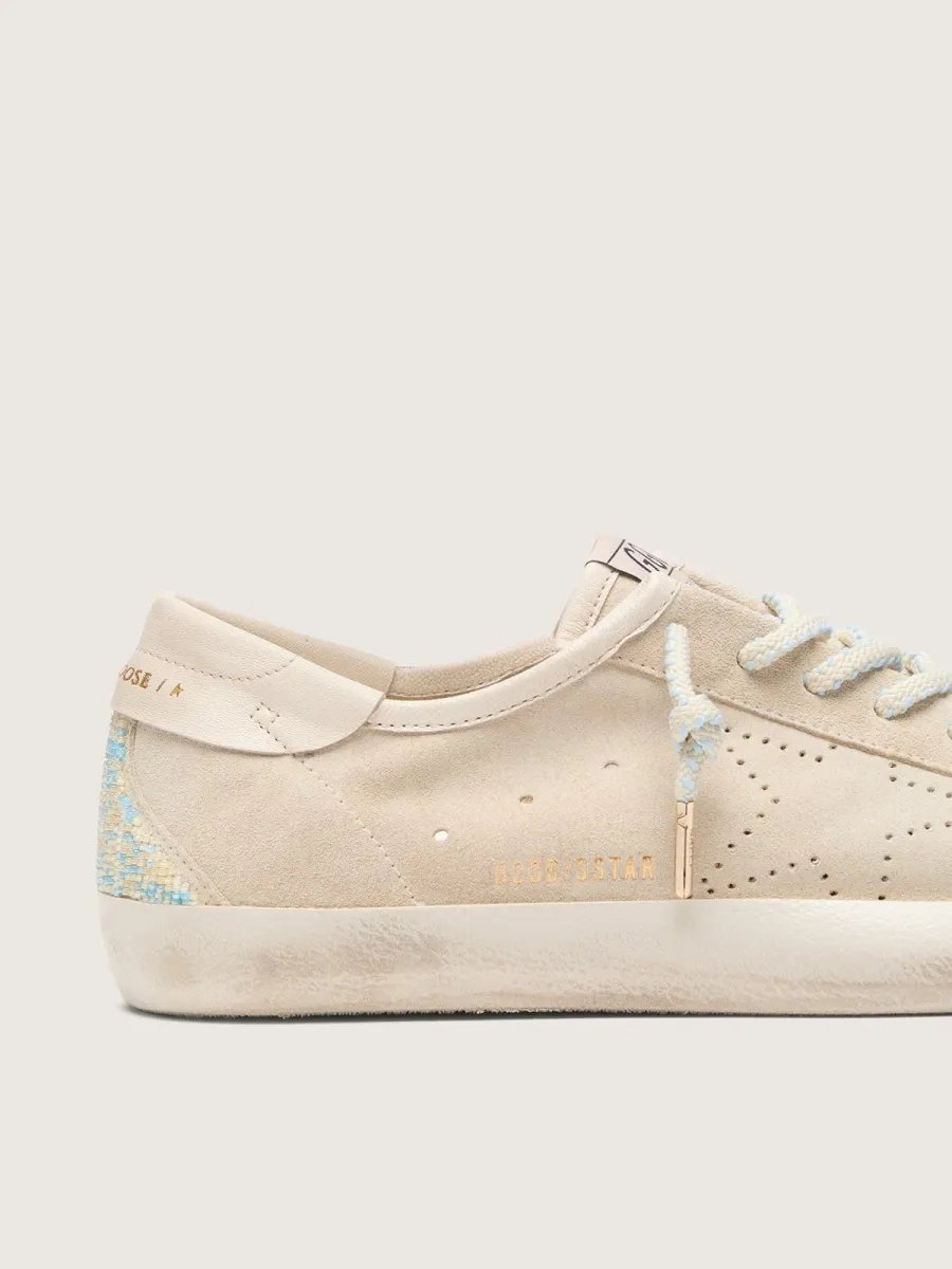 Super-Star uomo in suede crema con stella traforata e inserto con perline