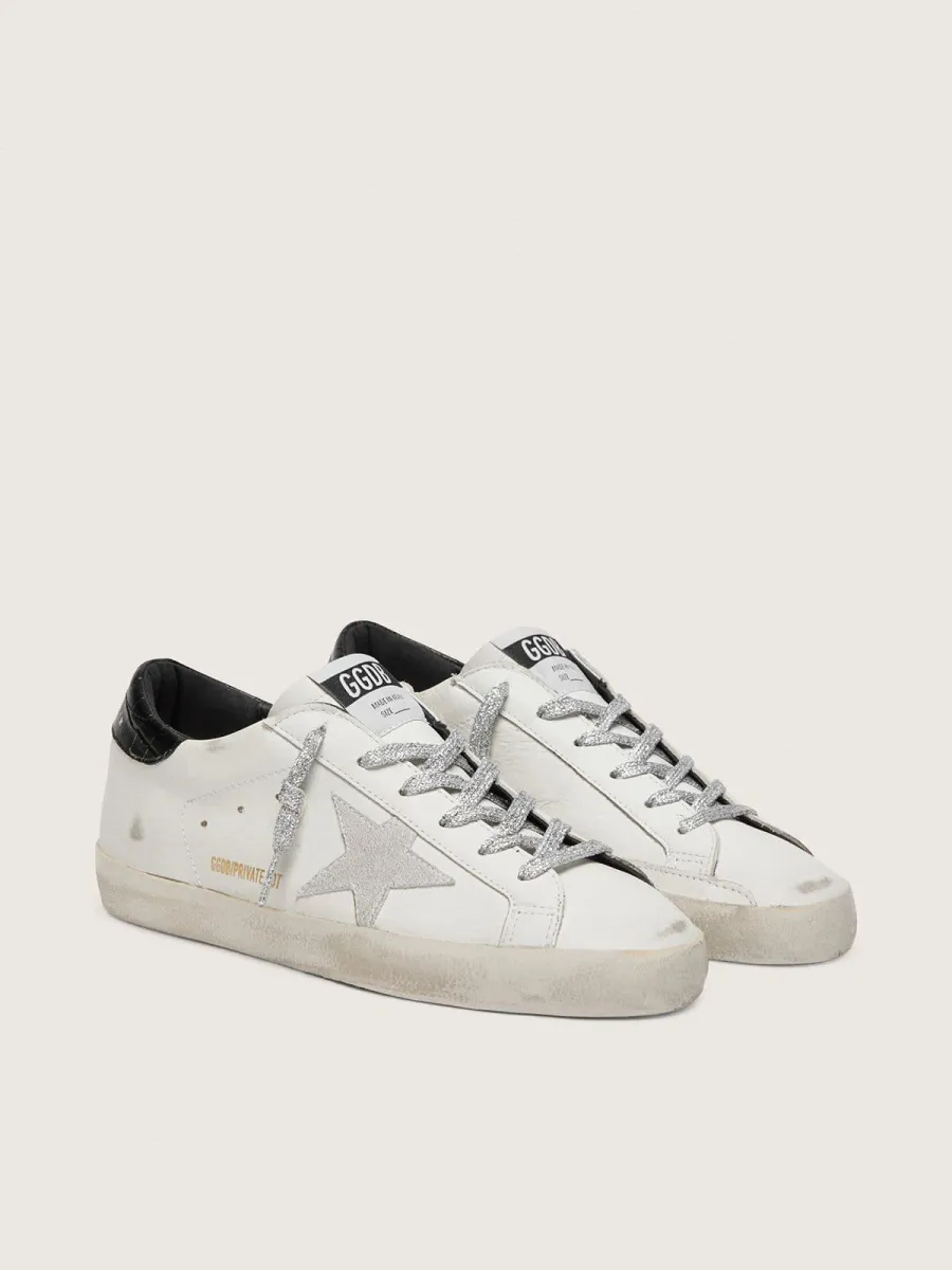 Super-Star Donna con stella in suede bianco e talloncino in pelle cocco nera