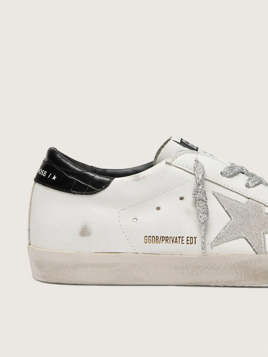 Super-Star Donna con stella in suede bianco e talloncino in pelle cocco nera