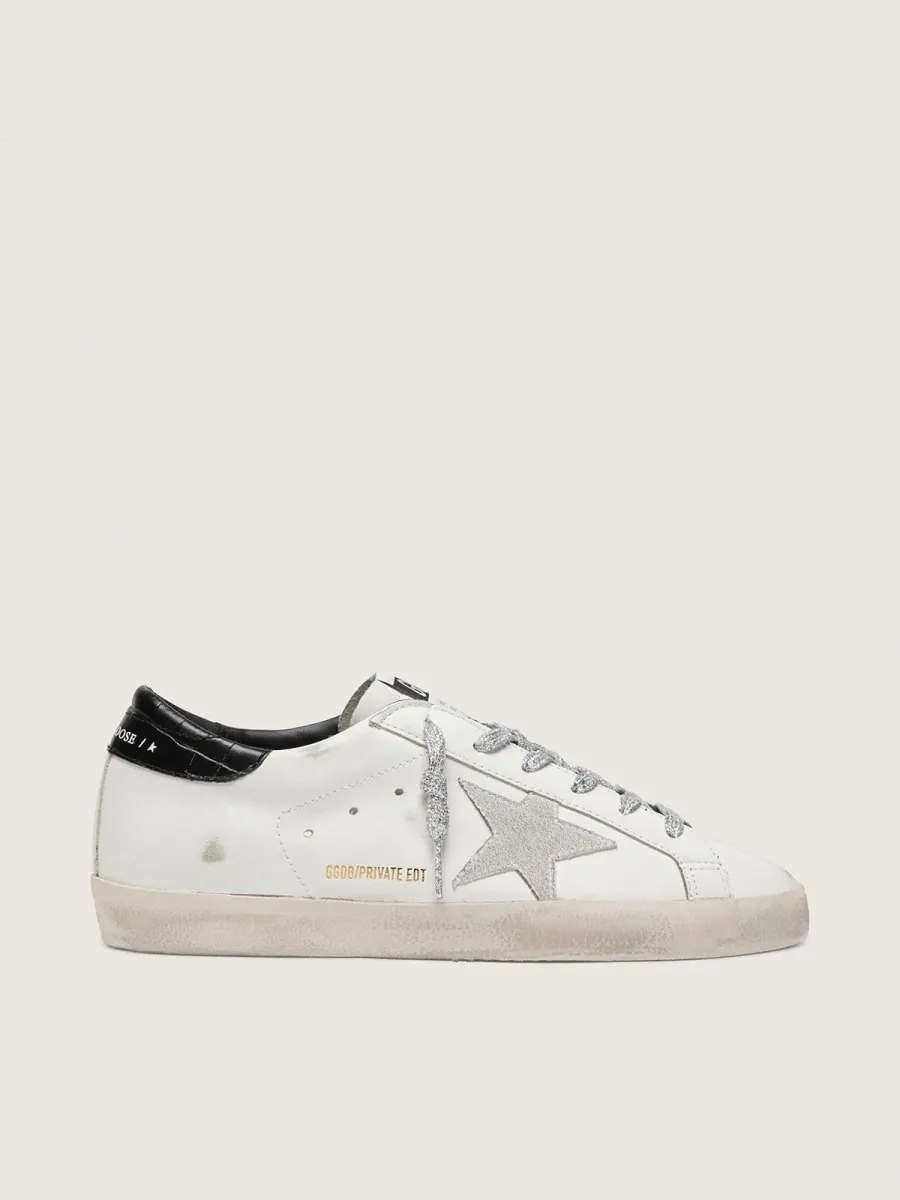 Super-Star Donna con stella in suede bianco e talloncino in pelle cocco nera