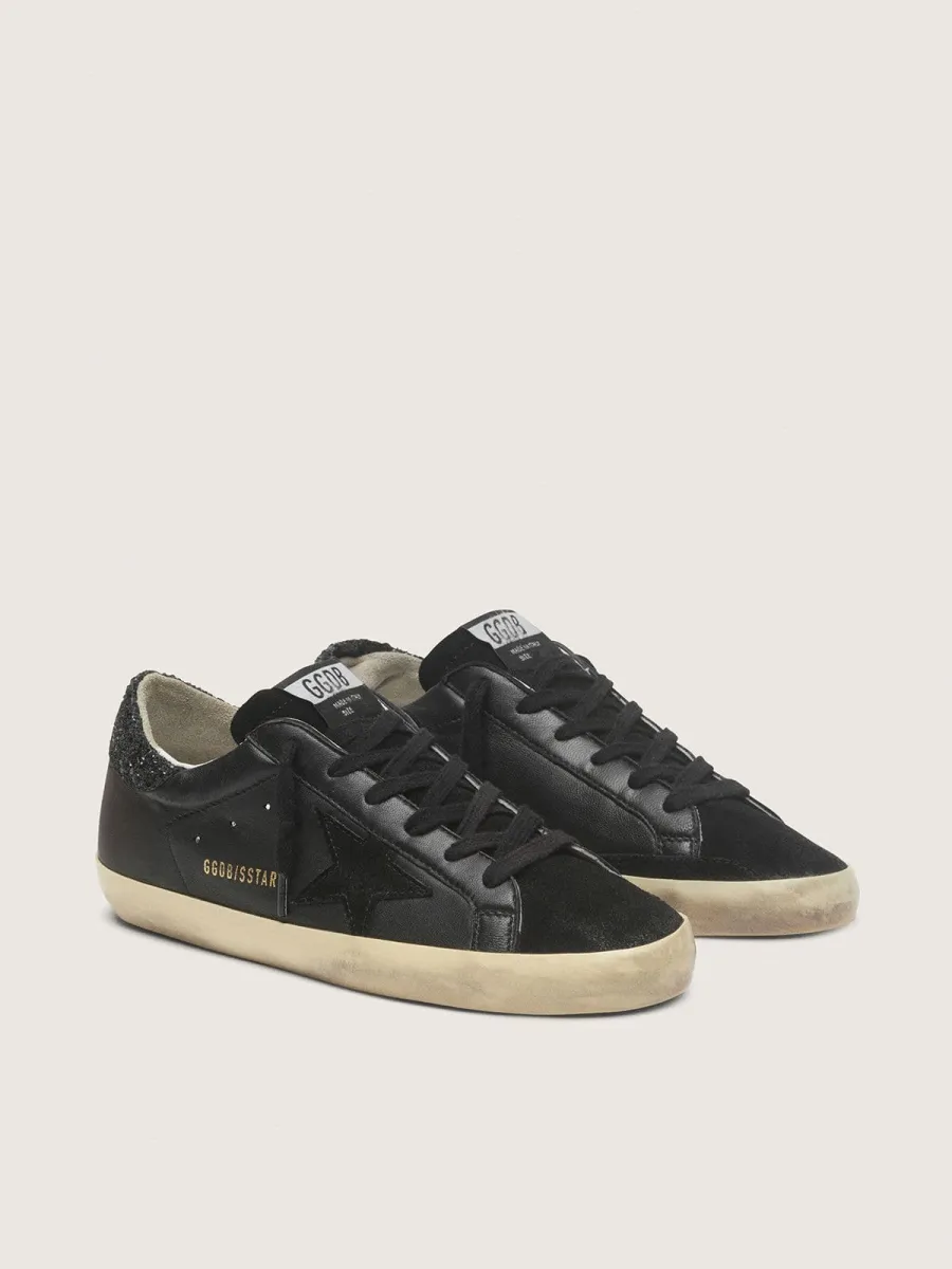 Super-Star Donna in nappa nera con stella in suede nero e talloncino in glitter neri
