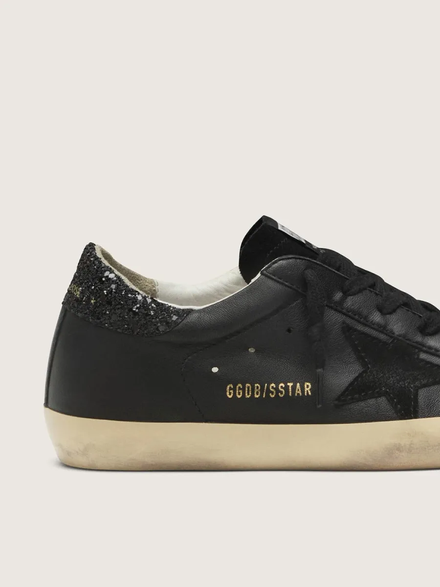 Super-Star Donna in nappa nera con stella in suede nero e talloncino in glitter neri