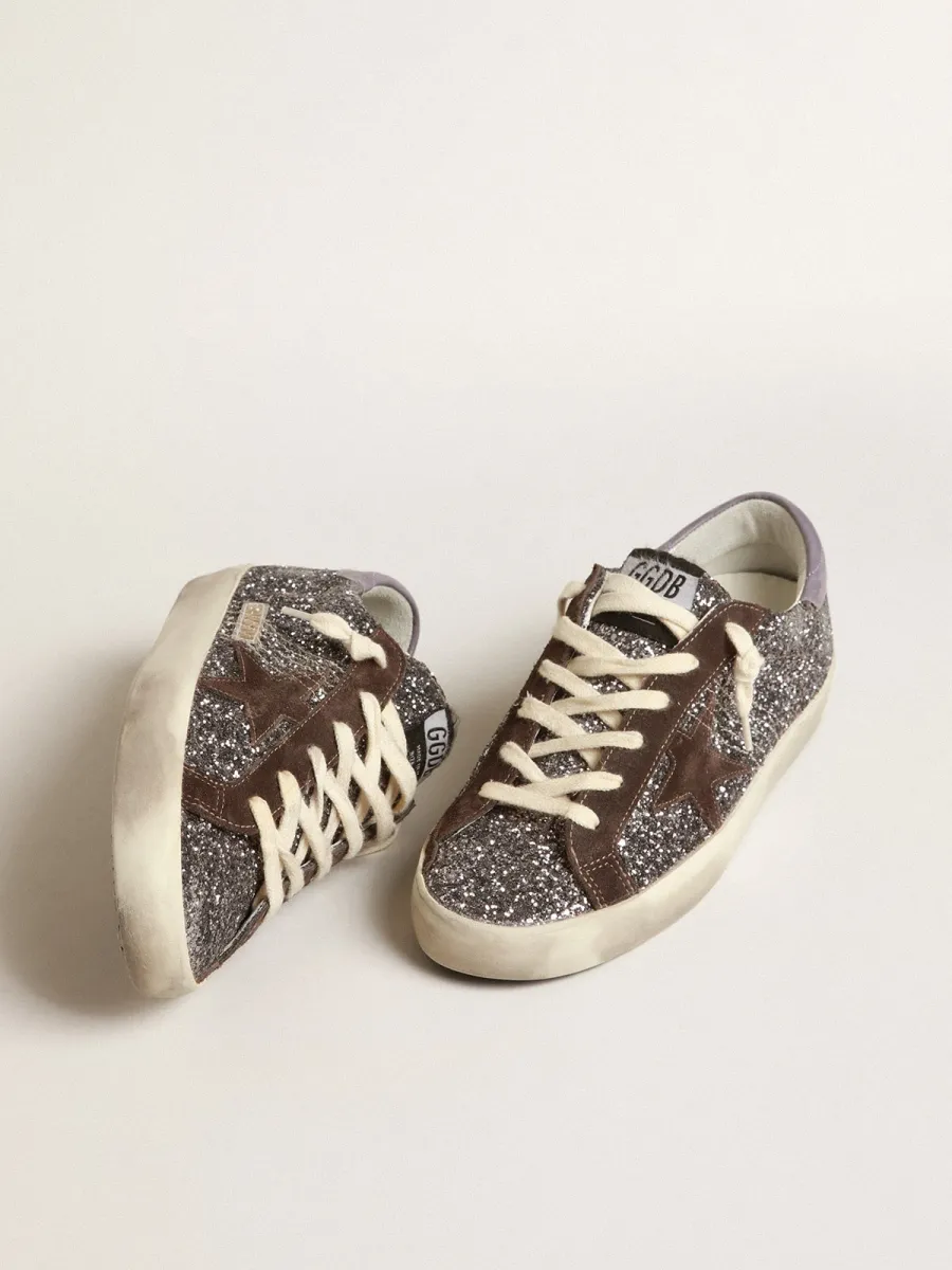 Super-Star in glitter con stella marrone e talloncino lilla
