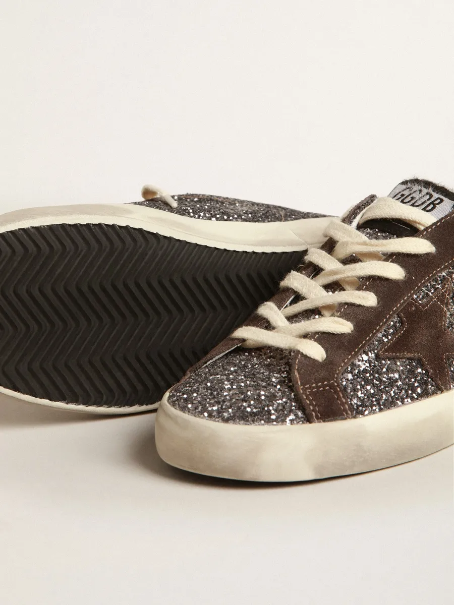 Super-Star in glitter con stella marrone e talloncino lilla