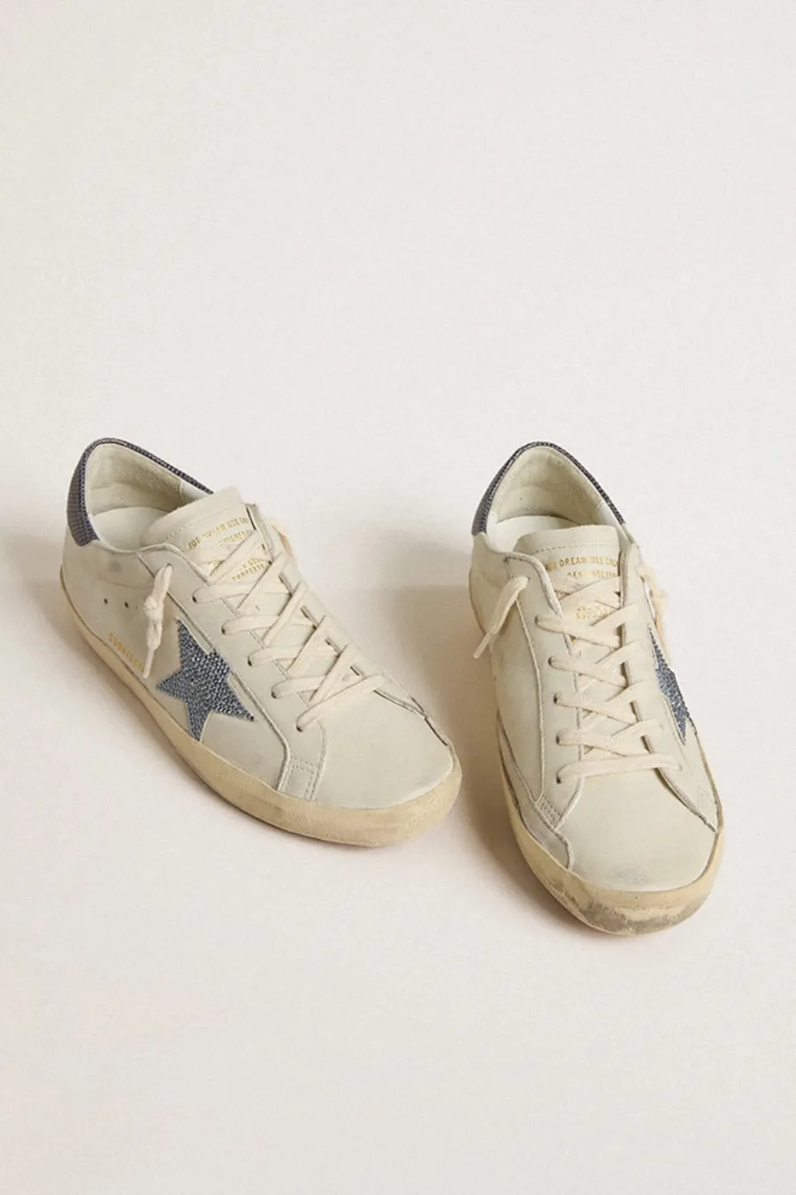 Super-Star  con stella in pelle color panna con cristalli Swarovski e talloncino in pelle blu con stampa lucertola