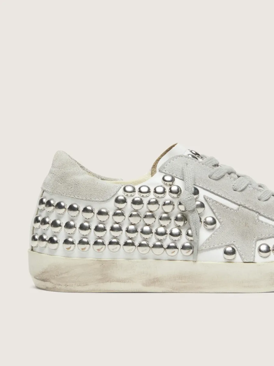 Super-Star donna in pelle bianca con stella grigio chiaro e borchie metalliche