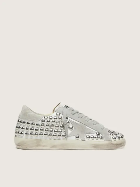 Super-Star donna in pelle bianca con stella grigio chiaro e borchie metalliche