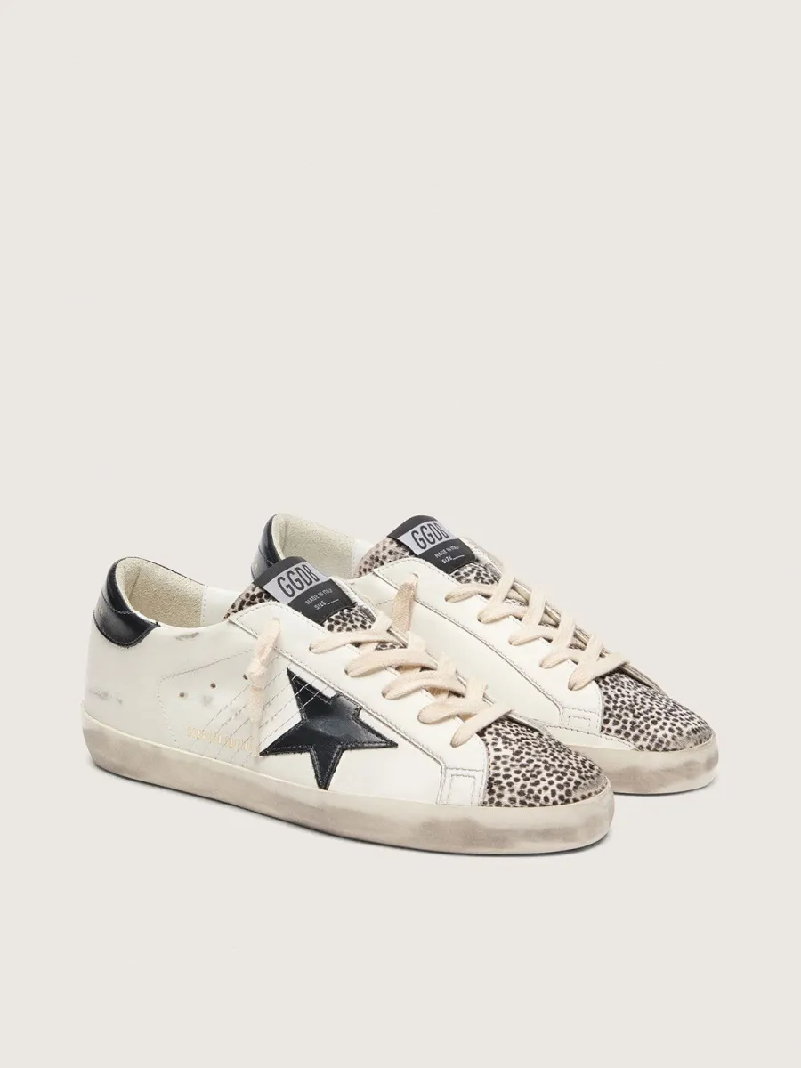 Super-Star LTD donna in pelle bianca con stella nera e dettagli cavallino