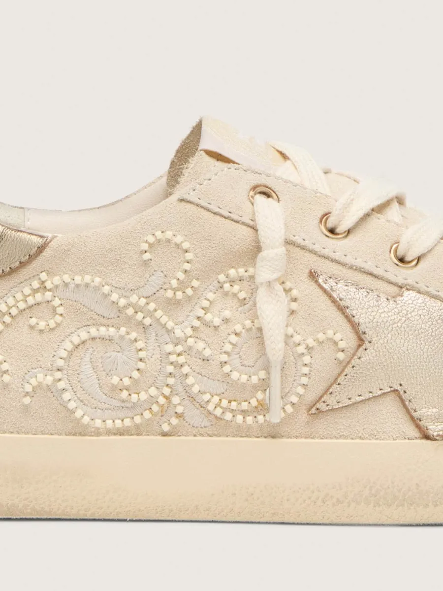 Super-Star LTD donna in suede color perla con stella oro e ricami in perline