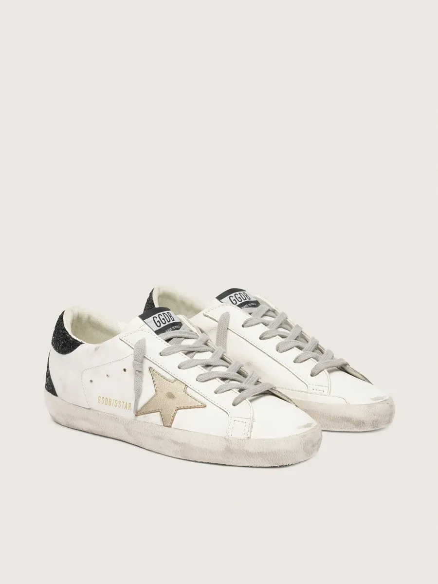 Super-Star Donna con stella oro e talloncino in glitter nero