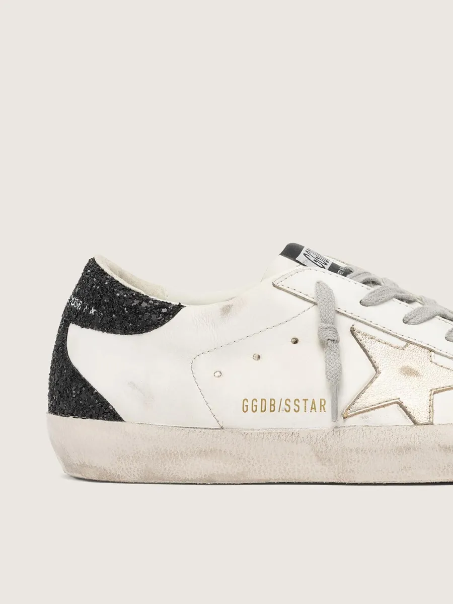 Super-Star Donna con stella oro e talloncino in glitter nero