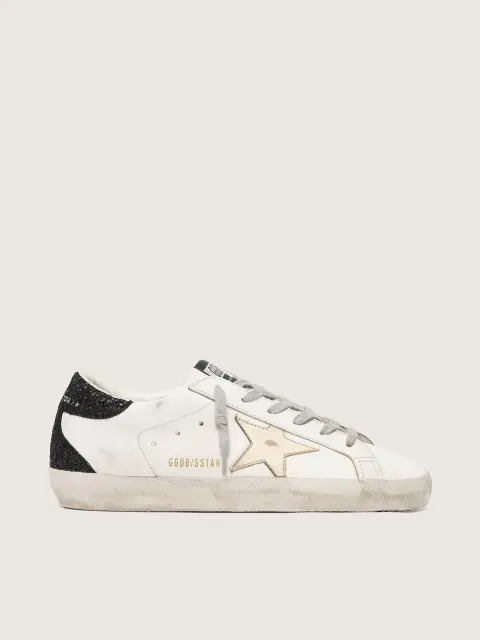 Super-Star Donna con stella oro e talloncino in glitter nero