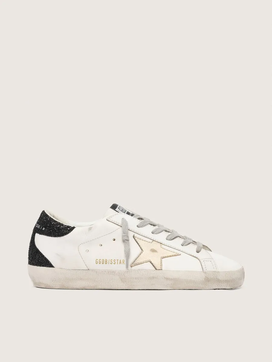 Super-Star Donna con stella oro e talloncino in glitter nero