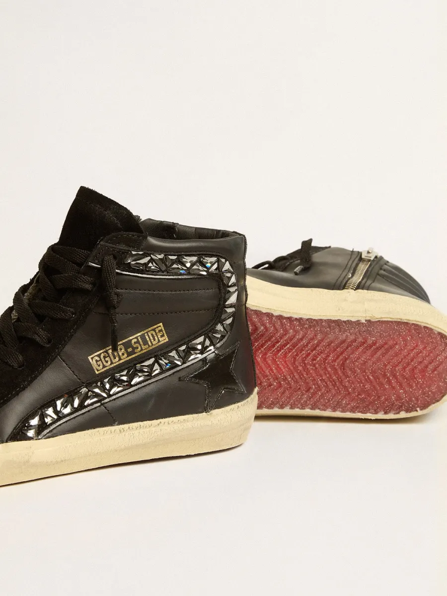 Slide in pelle con stella nera e virgola in cristalli Swarovski