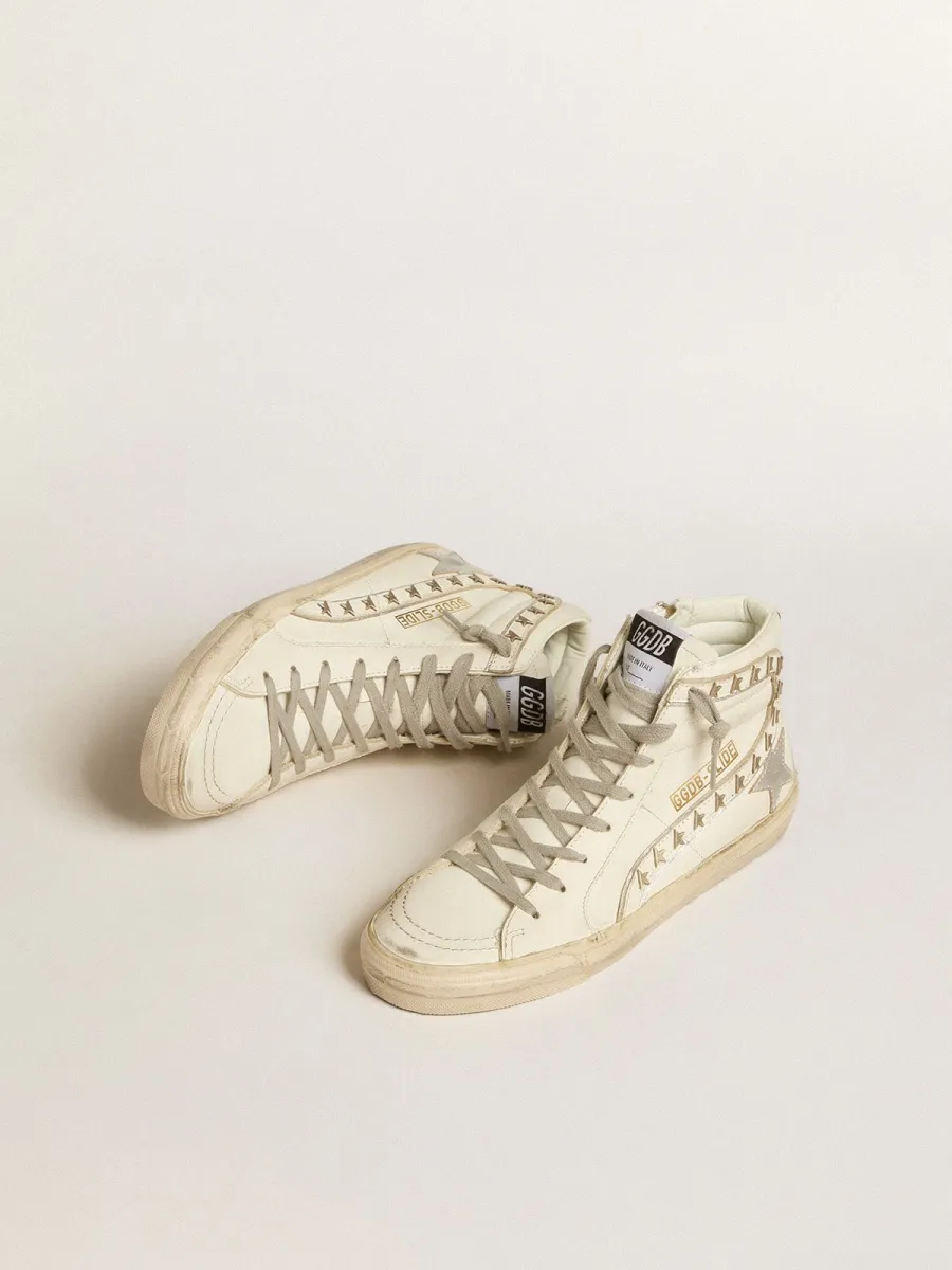 Slide con stella in pelle laminata argento e virgola in pelle con stelle
