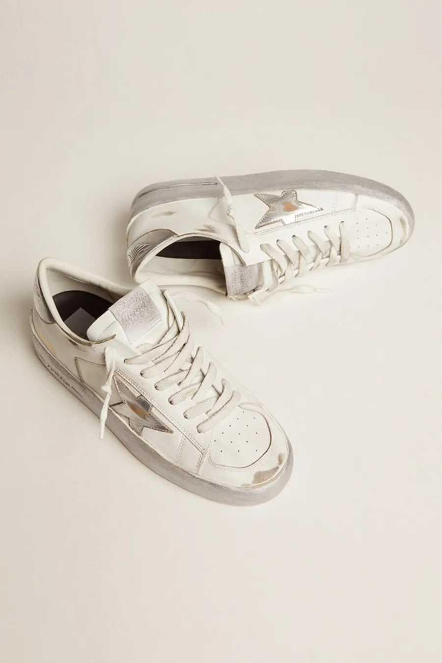 Stardan con stella e talloncino in pelle laminata argento