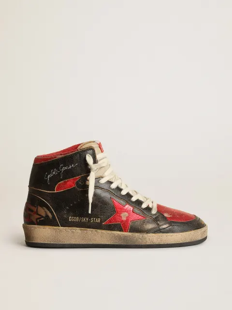 Sky-Star Donna in pelle lucida nera con stella rossa