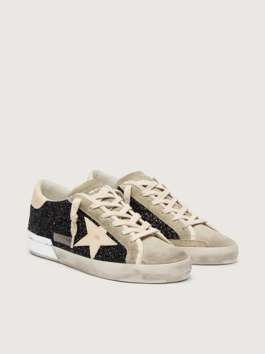Super-Star in glitter neri con stella panna e inserti in suede