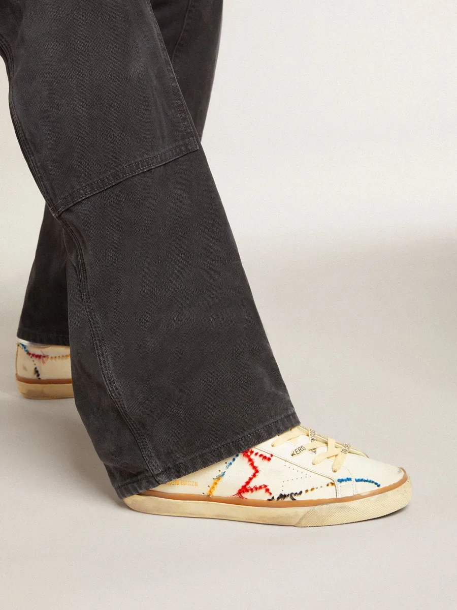 Super-Star Donna LTD con stella traforata e talloncino in pelle laminata