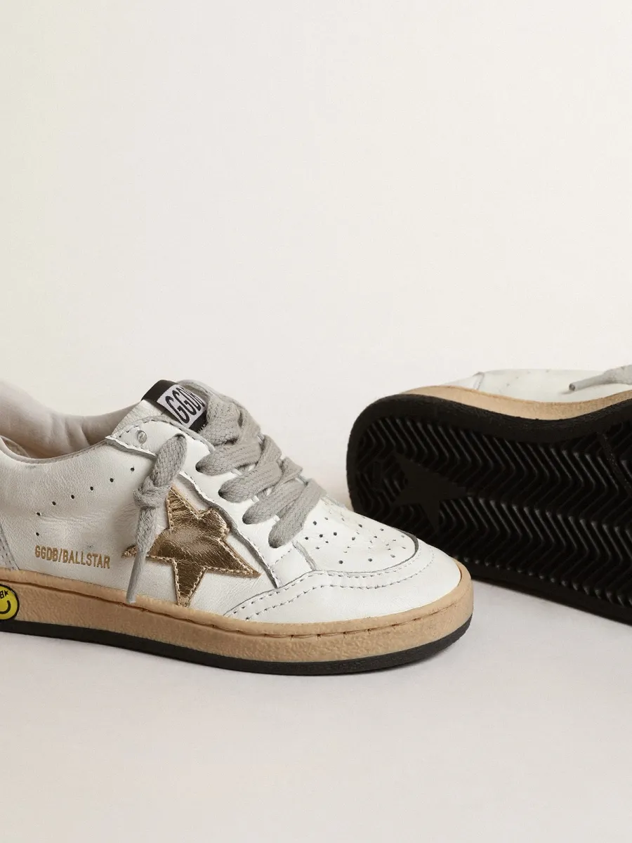 Ball Star Young con stella e talloncino in pelle laminata oro